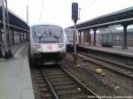 Eben eingefahrender InterCity % UBB GTW 2/6 (Hinterm Signal) im Bahnhof Stralsund am 11.4.13