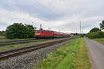 WFL 112 141 mit Dostock-Ersatzzug als RE80 nach Wrzburg Hbf  beim Verlassen von  Winterhausen. 14.7.2024