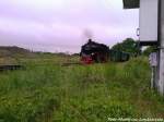 RBB 99 1784 aus Putbus mit Ziel Lauterbahc Mole kurz vor der Durchfahrt am Grobahnbahnhof Lauterbach (Rgen) am 26.5.13