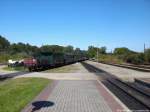 RBB 99 4011 bei der ausfahrt aus Putbus nach Ghren udn hat als Letztes noch einen Vollbeladenen Kohlewagen im Schlepptau am 26.8.13