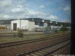 Blick auf das Netinera Werk wo Endwagen und Mittelwagen des Donald Duck Zuges Der BR ET 403 in Neustrelitz am 16.6.14