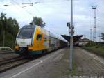 ODEG ET 445.115 als RE2 mit ziel Cottbus und 928 658 als RE6 mit ziel Lbeck Hbf  im Bahnhof Bad Kleinen am 13.7.14