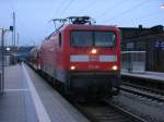 Die letzte,gebaute 112 ist die Rostocker 112 190 die,am 10.Dezember 2013,mit dem RE 13012 Sassnitz-Rostock,in Bergen/Rügen hielt.