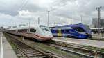 Ein Flirt des Meridian und ein Velaro D parken am Holzkirchner Flügelbahnhof in München Hbf.
Aufgenommen im September 2014.