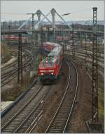 Die DB 218 432-3 (und am Zugsschluss eine Schwesterlok) verlassen mit einem IRE  von Lindau nach Stuttgart Ulm Hbf.