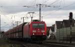 185 354-8 mit ihrem G�terzug am B� 38 in Weiterstadt am 22.Feb.2014