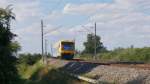 VT 650.76 der ODEG während der Fahrt von Prenzlau nach Warnitz am 24.08.2014 bei Seehausen