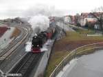 Am 19.12.2011 f�hrt 99 7243-1 mit ihrem Zug zum Brocken aus Wernigerode aus.