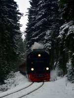 Mit meiner neuen Kamera der Nikon D 3200 ging es am 6.1.2015 in den Harz.Mit dem P 8940 rollt 99 7234-0 dem Bahnhof Schierke entgegen.
