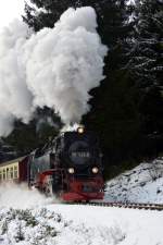 Mit meiner neuen Kamera der Nikon D 3200 ging es am 6.1.2015 in den Harz.Mit einer mächtigen Rauchwolke donnert 99 7245-6 mit P 8904 die Steigung hinter Sorge hoch.