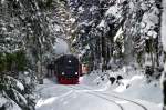 99 7241-5 kam mit N 8940 am 03.04.2015 vom Brocken kurz vor Schierke Bergab gerollt.Hier passiert sie das Esig von Schierke.
