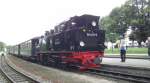99 4011-5 am Bahnsteig in Binz