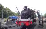 99 4801-9 beim Wasser nehmen in Putbus.Links 251 901-5
