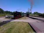 R�BB 99 1781 bei der Einfahrt in Putbus w�hrend dessen Mh 52(99 4632) warten muss bis der Zug im Bahnhof ist um als 2 Lok angeh�ngt zu werden am 24.7.13