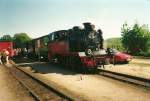 99 4801 bei der Kreuzung in Binz.Damals lag das Gleis noch noch nicht im Schotter und es gab noch keinen Bahnsteig.