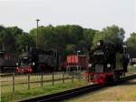 99 4011-5 f�hrt am 02.08.2014 an 99 783 in Putbus vorbei