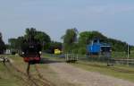 Begegnung zwischen 99 783 und 251 901-5 am 02.08.2014 in Putbus