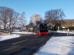 99 4801 bei strahlenblauen Wintertag,am 18.Januar 2016,bei der Ausfahrt aus Binz.