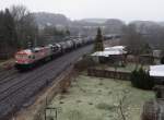 Hvle Tiger V330.4 (250 004-9) ist am 21.01.14 mit einem Kesselzug im Vogtland unterwegs.