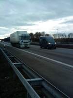 SZM Renault Magnum mit Kofferauflieger der Firma Umagas gesehen auf der A 61 an der Raststtte Schifferstadt am 06.01.2014