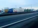 SZM Mercedes-Benz Actros mit Khlkoffer-Auflieger der Firma frutania gesehen auf der A 61, Hhe Raststtte Dannstadt, am 15.01.2014