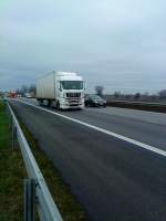 SZM MAN TGX 18.440 mit Khlkofferauflieger gesehen auf der A 61, Hhe Raststtte Dannstadt , am 16.01.2014