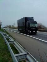 LKW MAN mit Kofferaufbau gesehen auf der A 61 Hhe Rasthof Dannstadt am 18.03.2014