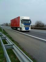 SZM DAF XF mit Kofferauflieger gesehen auf der A 61 Hhe Rasthof Dannstadt am 18.03.2014