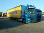 LKW SZM MAN TGA mit Pritsche-Planen-Auflieger der Spedition LKW Augustin auf dem Autohof in Grnstadt am 12.09.2013