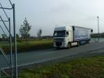 LKS SZM DAF XF mit Pritsche-Planen-Auflieger auf dem Rckweg vom Autohof in Grnstadt am 26.09.2013