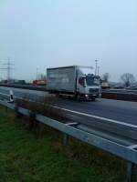 LKW MAN TGL 10.220 mit Pritsche-Planen-Aufbau gesehen auf der A 61 an der Raststtte Dannstadt am 14.01.2014