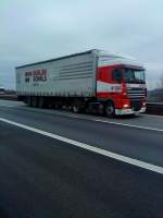 SZM DAF XF mit Pritsche-Planen-Auflieger der Spedition Gehlen-Schols Logistics gesehen auf der A61, Hhe Raststtte Dannstadt, am 16.01.2014