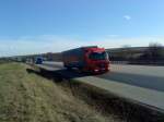 SZM Mercedes-Benz Actros 1844 mit Pritsche-Planen-Auflieger der Spedition Sostmeier gesehen auf der A 6 - Hhe Autohof Grnstadt - am 28.01.2014