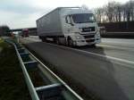 SZM MAN TGX 18.440 mit Pritsche-Planen-Auflieger gesehen auf der A 61 Hhe Rasthof Dannstadt am 18.02.2014