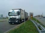 LKW Mercedes-Benz Actros 2545 Hngerzug mit Pritsche-Planen-Aufbau der Spedition GRT  gesehen auf dem Rasthof Dannstadt an der A 61 am 18.03.2014