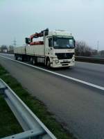 LKW Mercedes-Benz Actros Hngerzug mit Pritschenaufbau der Spedition Vckt Transporte gesehen auf der A 61 Hhe Rasthof Dannstadt am 18.03.2014