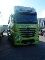 LKW SZM Mercedes-Benz Actros 1845 mit Tankauflieger der Spedition Translait aus der Schweiz bei der Rast auf dem Autohof Grnstadt am 11.11.2013