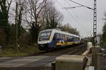 Auf dem Weg von D�sseldorf nach Kleve ist 648  421 der Rhein-Ruhr-Bahn und ein weiterer LINT bei Meerbusch-Osterath unterwegs.