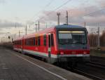 S3 von Rostock Hbf nach Rostock-Seehafen/Nord kurz vor der Ausfahrt im Haltepunkt Rostock-Dierkow.04.01.2012