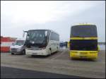 Mercedes Sprinter aus der Schweiz und Setra 411 HD von Stottmeier aus Deutschland und Neoplan Spaceliner von Oberhavel-Bus-Express aus Deutschland im Stadthafen Sassnitz.