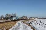 218 308 mit einem Kesselwagenzug aus Burghausen kommend am 21. Januar 2026 bei Heiligenstatt.