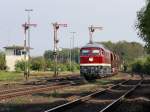 Die 232 088 am 21.05.2011 mit einem Schotterzug bei der Durchfahrt in Luitpoldhtte.