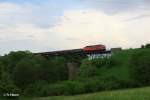 233 176-1 mit Schrottzug auf dem Viadukt bei Seuen.