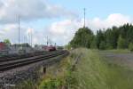 233 217-9 mit dem morgentlichen 45367 NN - Cheb beim warten auf die berholung durch 612er mit RE und Vogtlandbahnin Wiesau.