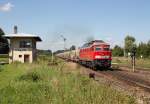 233 373-0 erhielt mit ihrem leeren Müllzug Richtung Freilassing am 28.08.14 in Tüßling Ausfahrt.