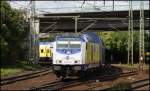 246 010 fhrt mit einem Metronom aus Cuxhaven in den Harburger Bahnhof ein.(19.08.11)