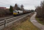 Die Mühldorfer 247 031-8 war am stark bewölkten 10.01.16 mit einem Kesselzug von Mühldorf kommend nach München in Poing unterwegs.