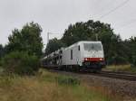 Die 285 105 am 12.08.2010 mit einem Autozug unterwegs bei Eystrup.