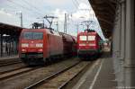 Die 152 105-3 DB Schenker Rail Deutschland AG mit einem Tads Ganzzug und die 112 170 mit dem RE20 (RE 17639) von Uelzen nach Halle(Saale)Hbf, trafen sich in Stendal.