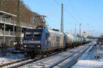 145 063-4 mit Kesselwagen am Haken. Tostedt, 19.01.2024.